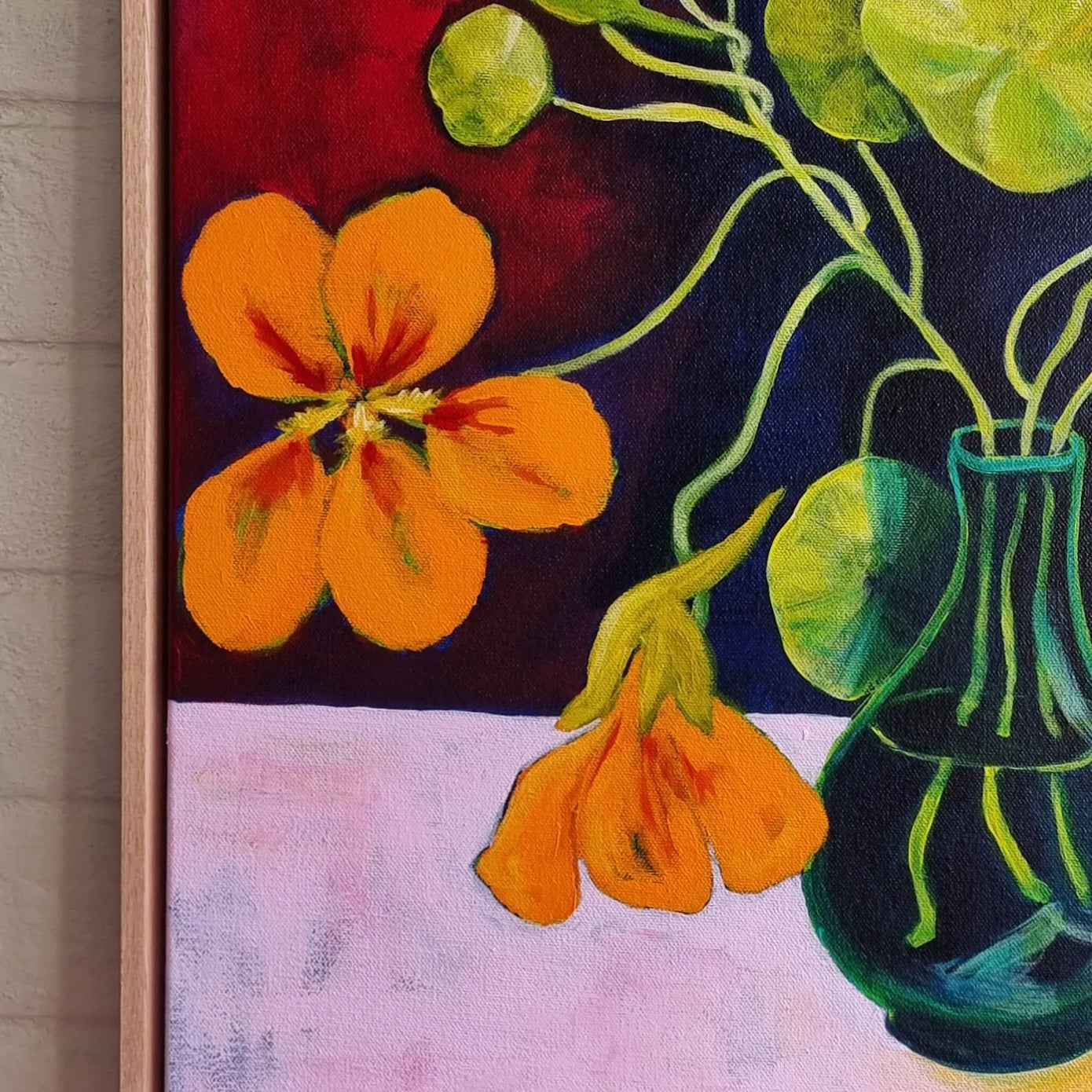 Nasturtiums in green vase