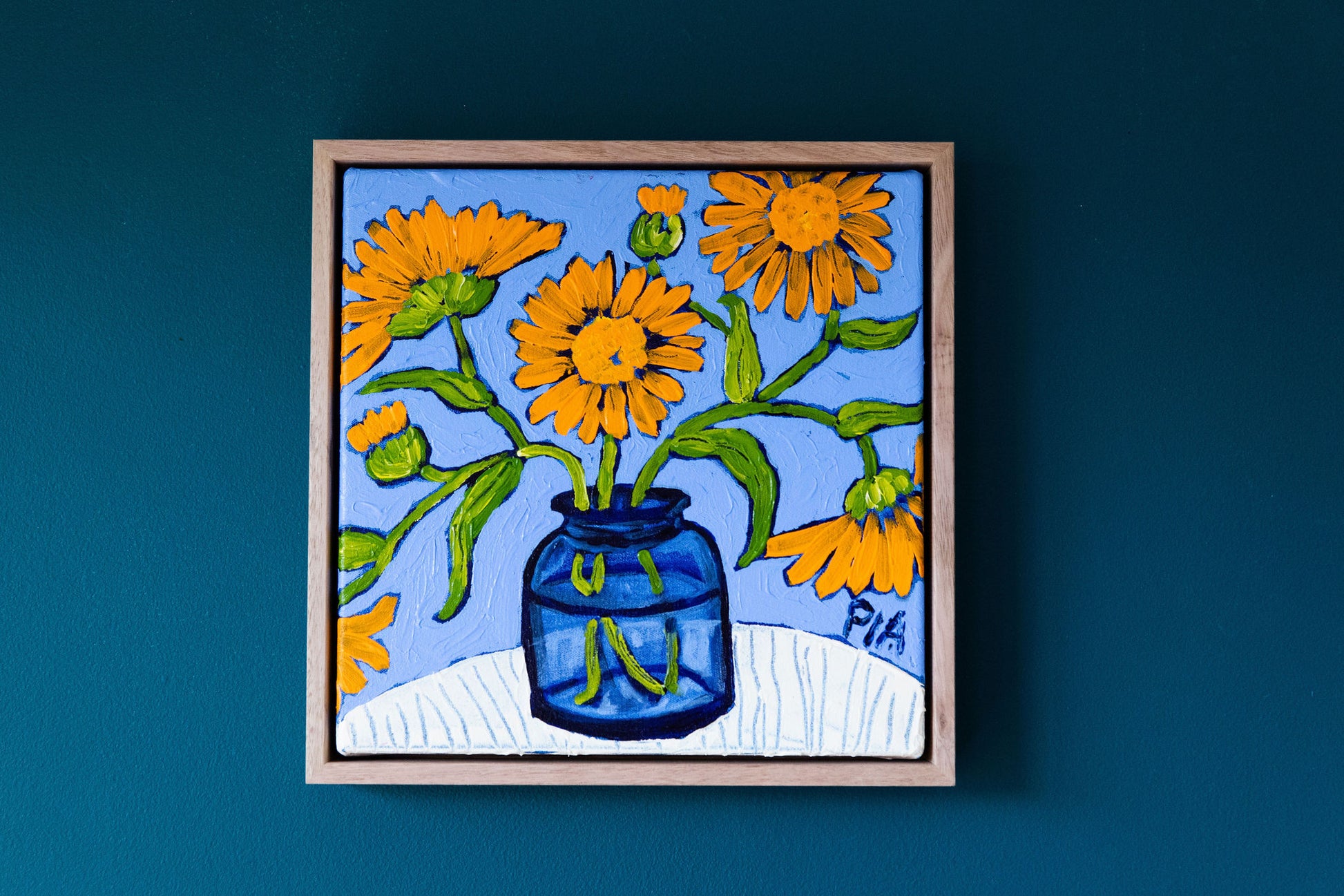Calendula in Blue Glass by Pia Kuykhoven